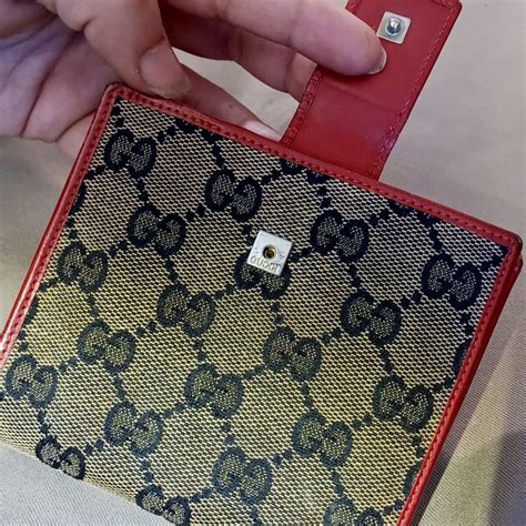 old gucci tri fold wallet|Gucci .